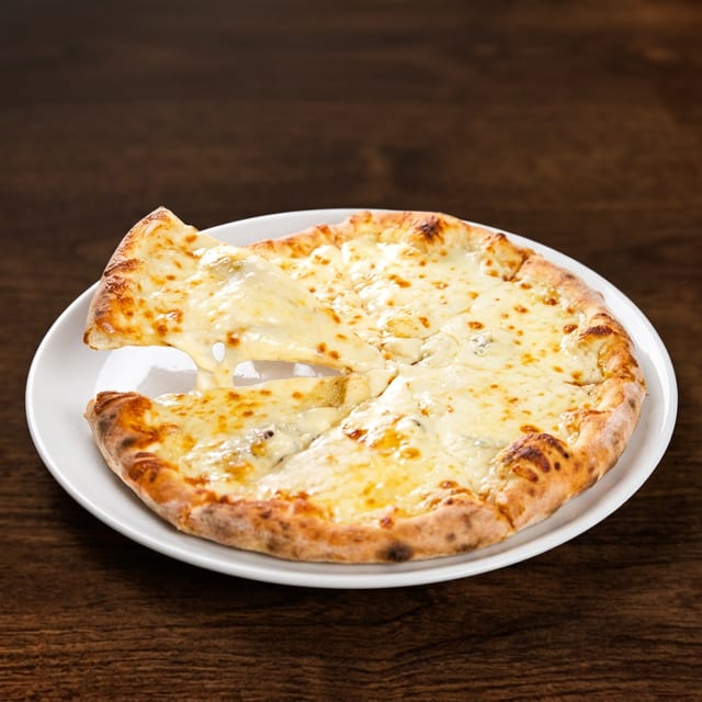 Quattro Formaggi Pizza (Four Cheese Pizza).